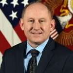 John E. Whitley